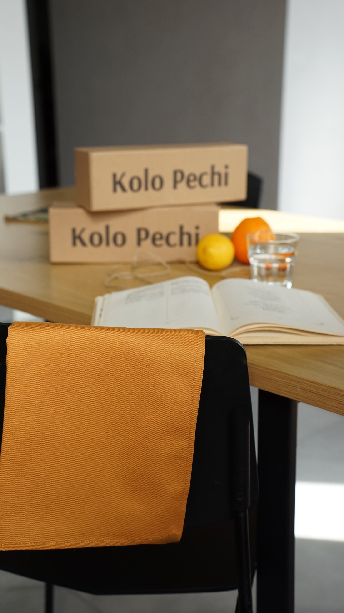 Sunset Kitchen Towel — styled in kitchen setting, warm tones, made in Ukraine