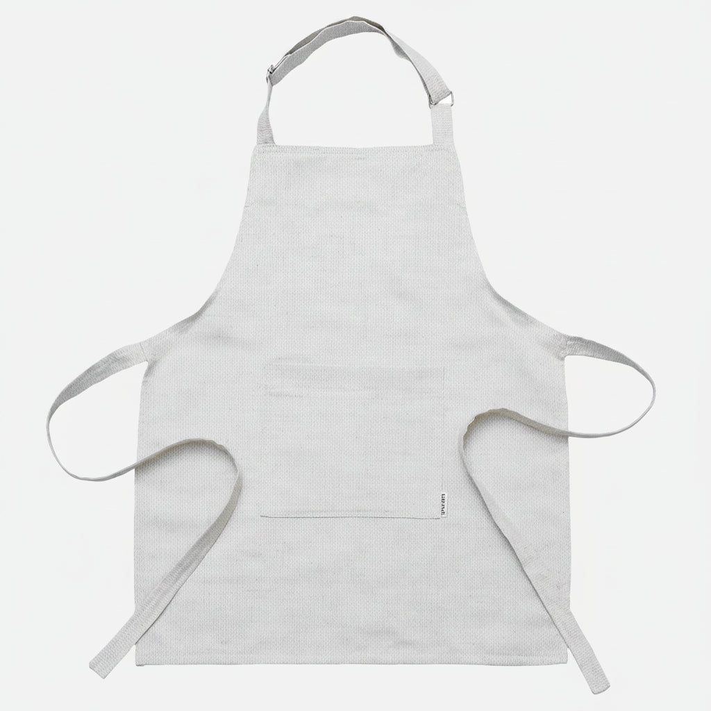 Natural beige hemp bib apron with a front pocket — Steppe collection by Kolo Pechi