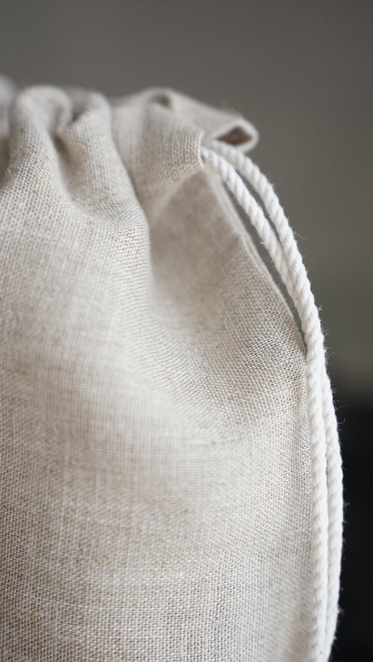 A part of the linen bread bag with the rope