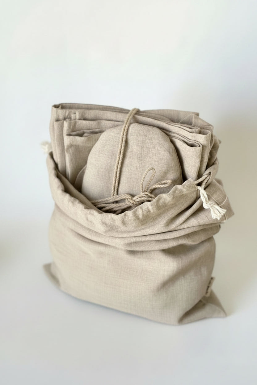 Linen kitchen textile set laid flat with cotton strap — Polissia collection by Kolo Pechi