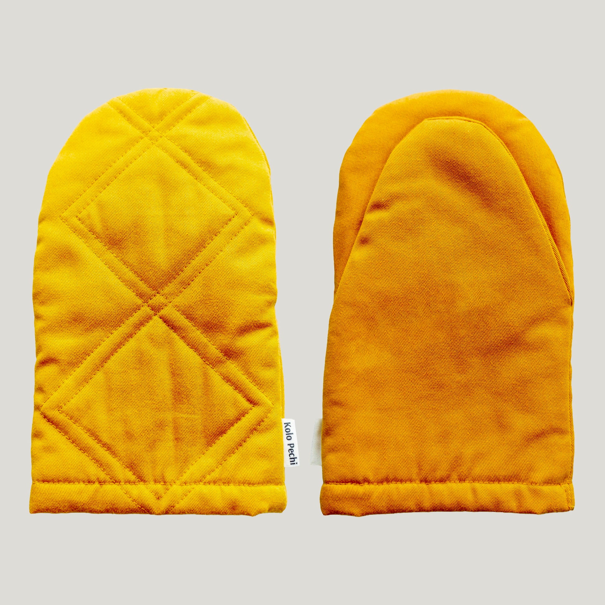 Sunset Oven Mitt — quilted heat-resistant cotton, warm sunset colour, Kolo Pechi