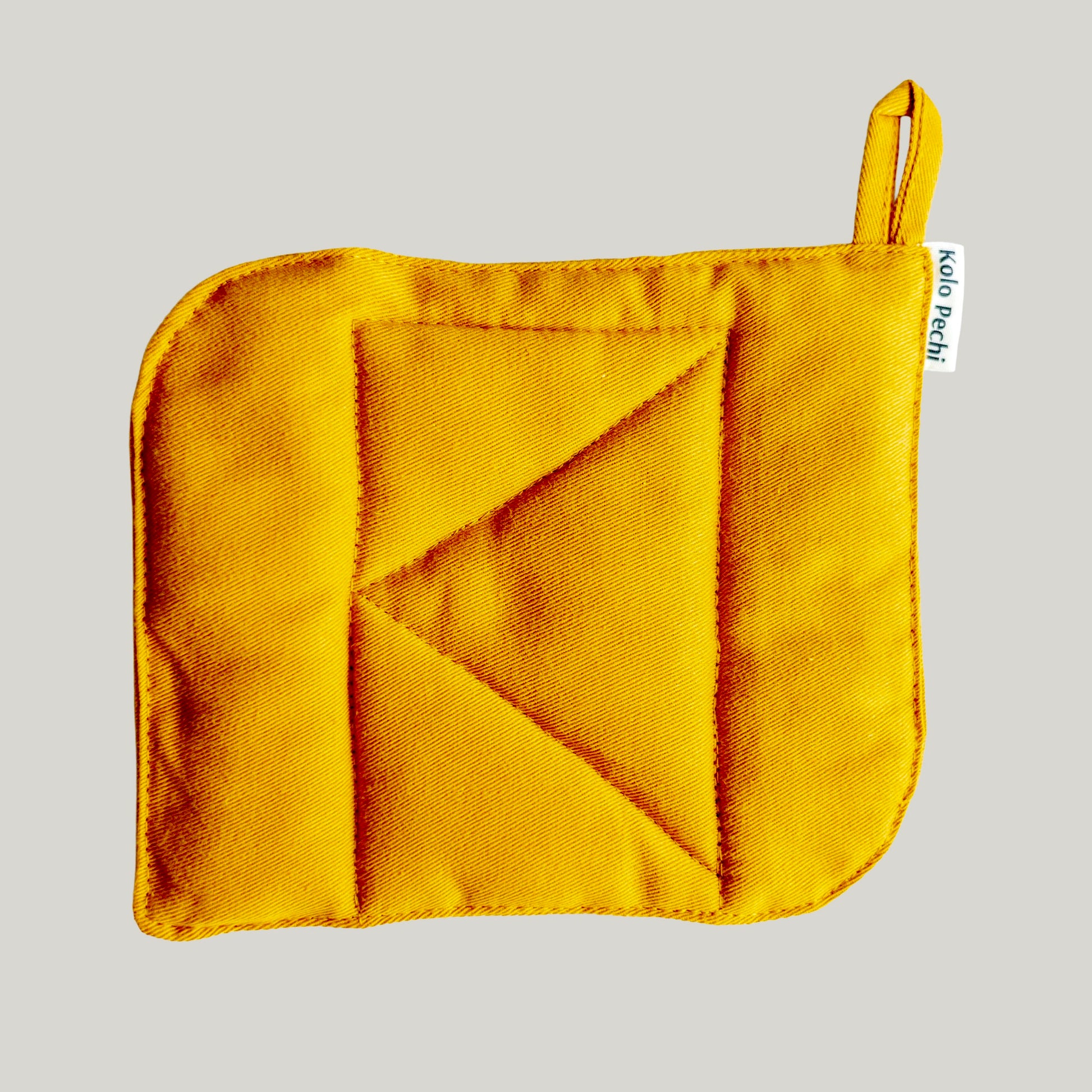 Sunset Pot Holder — geometric quilted detail with hanging loop, natural cotton, handcrafted in Ukraine