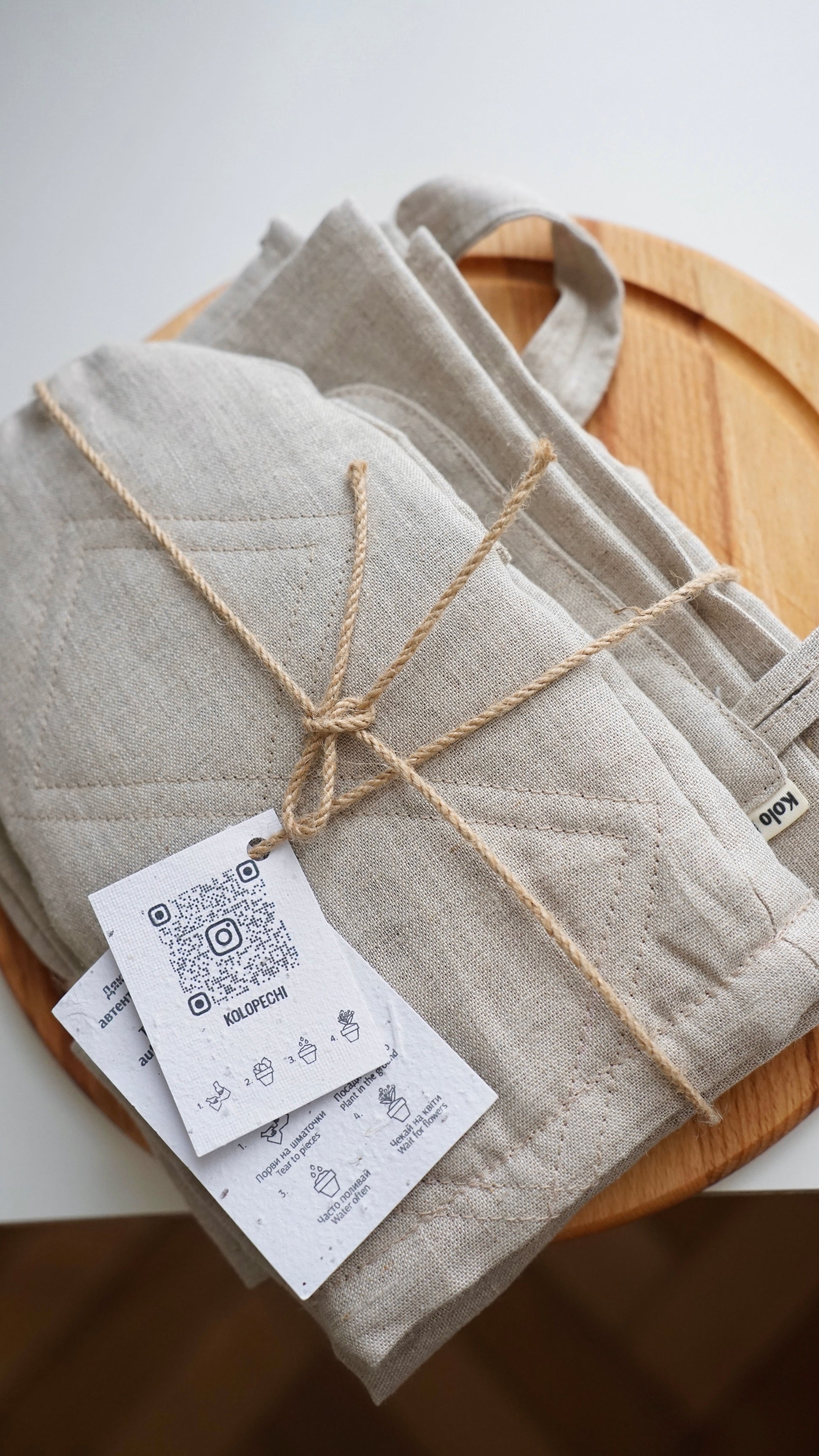 Folded linen kitchen set with blooming seed paper card — Polissia collection by Kolo Pechi