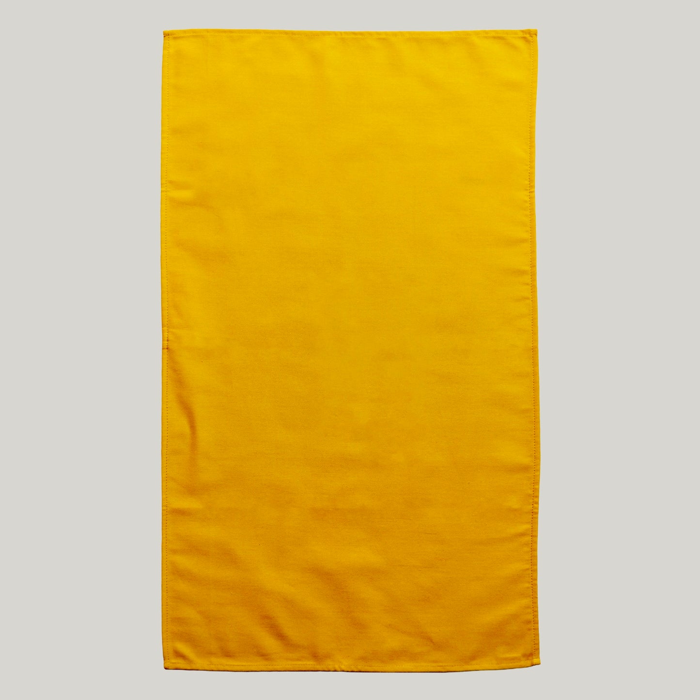 Sunset Kitchen Towel — 70×50 cm, natural cotton, warm sunset colour, handcrafted in Ukraine
