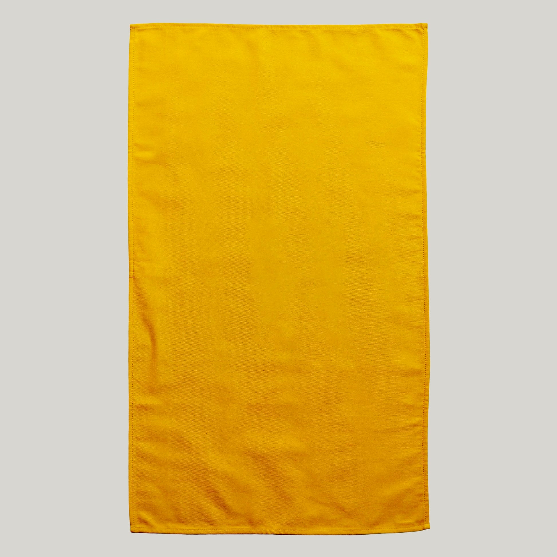 Sunset Kitchen Towel — 70×50 cm, natural cotton, warm sunset colour, handcrafted in Ukraine