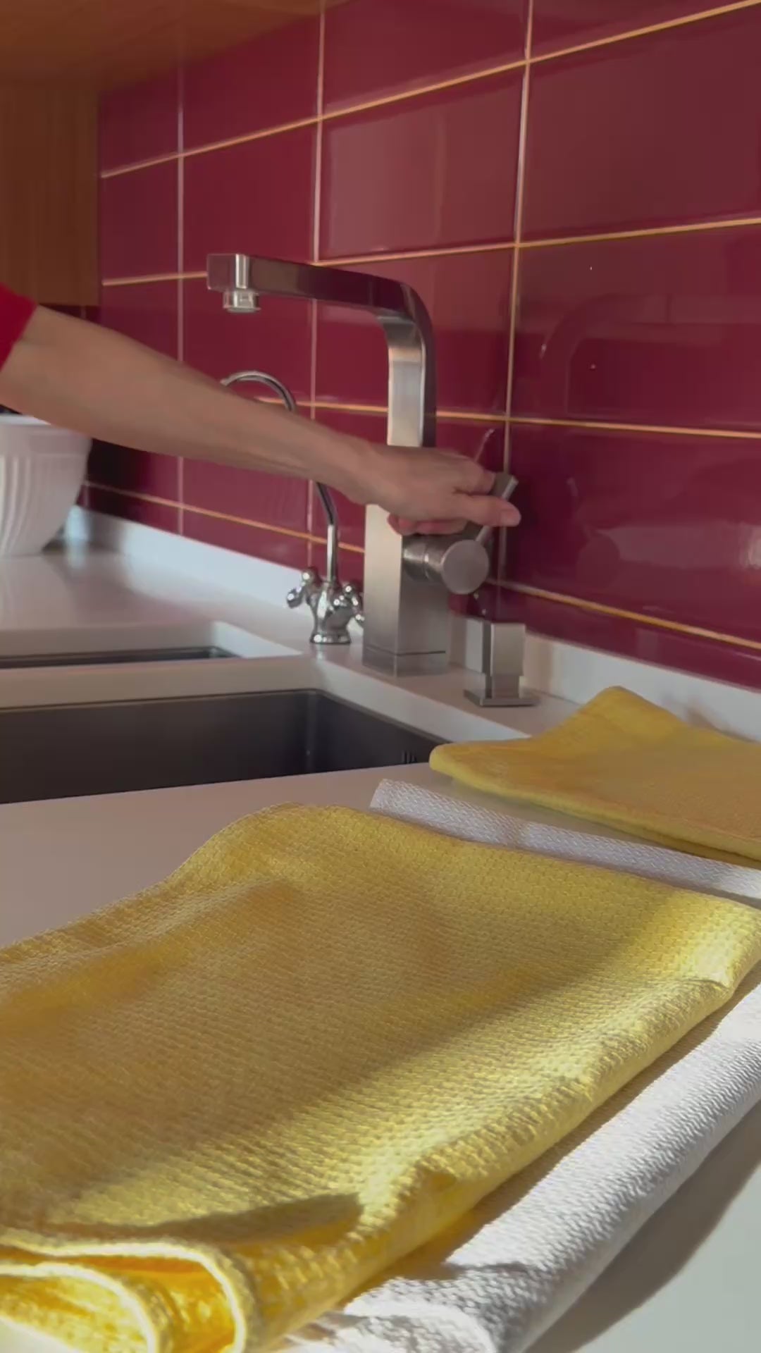 Hemp kitchen towels from Odesa Sea and Steppe being used to wipe clay cup